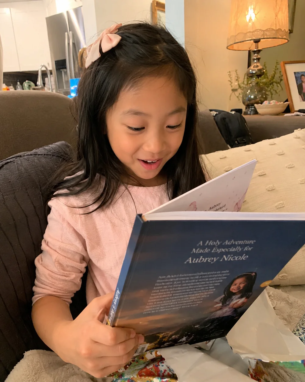 Aubrey reading her personalized story